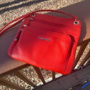 Calvin Klein orange crossbody purse
